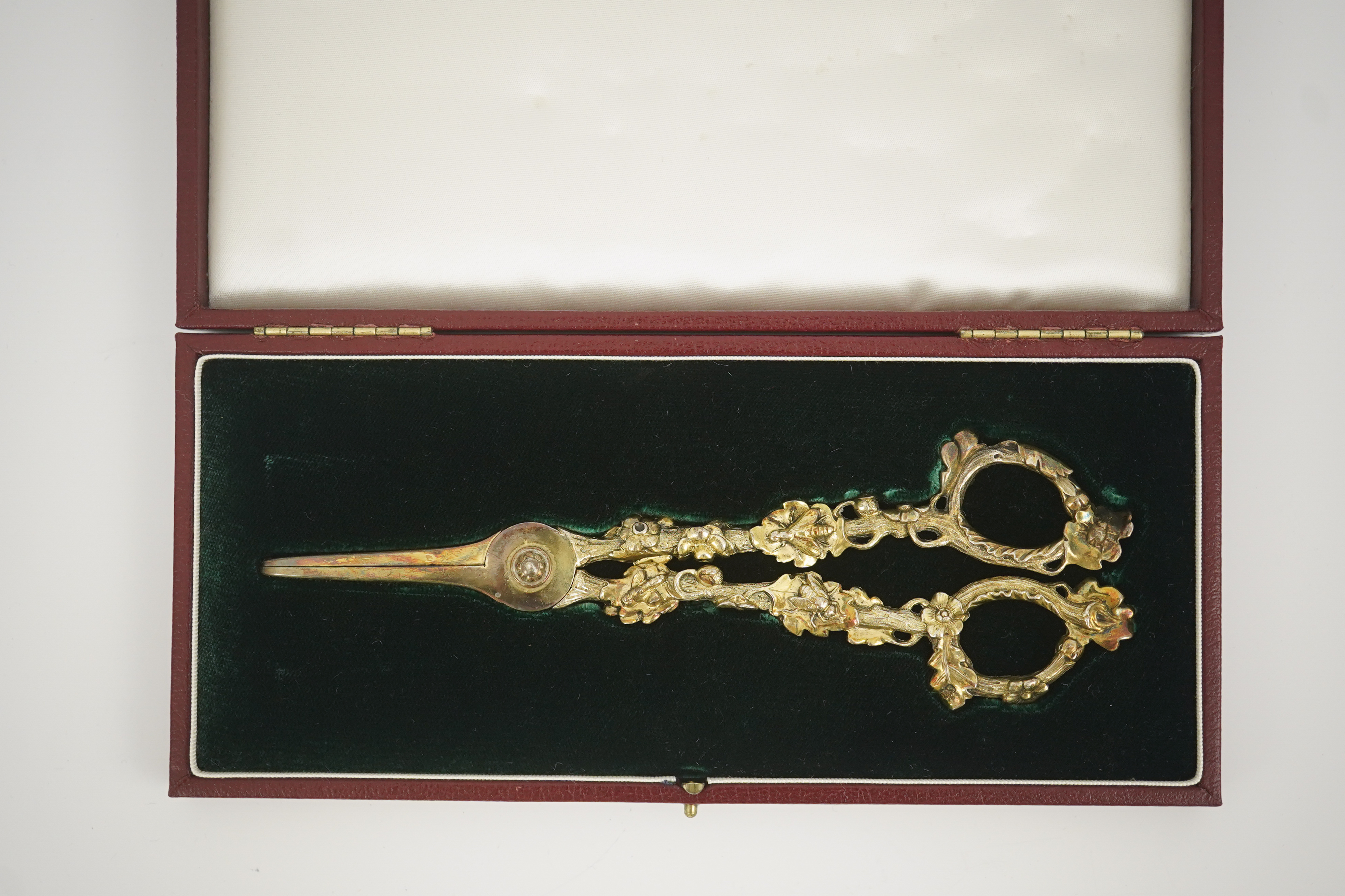 A cased pair of William IV Paul Storr silver gilt grape shears, in later case